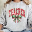 hpvjit-562mr-ash-sm-archedredandgreenteacher-hpv-627853.jpg Arched Red And Green Teacher Unisex NuBlend Crew Sweatshirt