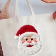 Faux Yarn Stitched With Cheer Santa Canvas Jumbo Tote